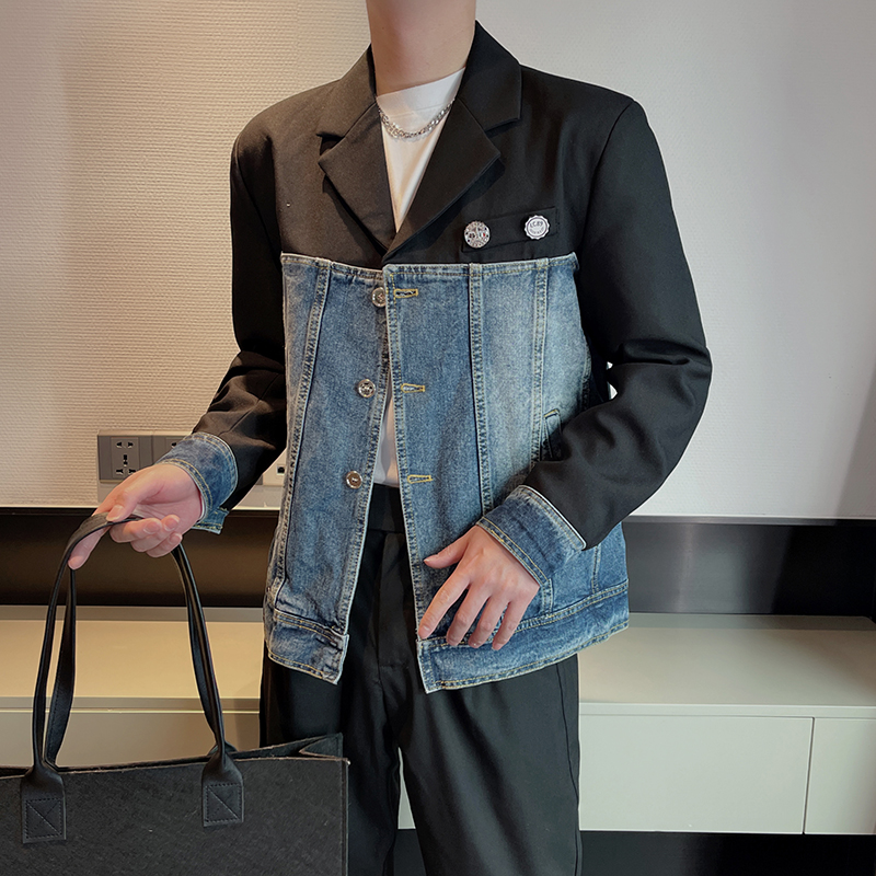 Man in a hybrid black blazer and denim vest