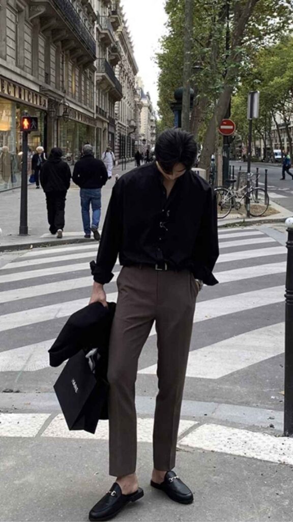 Matte black sunglasses + Inky open-collar shirt + Chocolate slim trousers + Sleek black leather loafers
